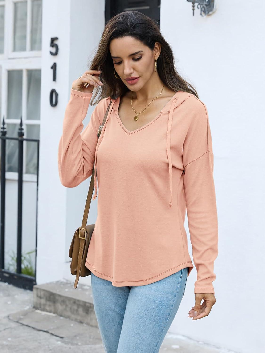imageWomens V Neck Hoodies Lightweight Drawstring Sweatshirts Casual Loose Pullover Fall Long Sleeve Hooded Top 2026Peachy Pink
